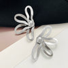 Wholesale Alloy Electroplated Geometric Flower Hollow Women's Earrings With Retro Style