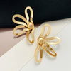 Wholesale Alloy Electroplated Geometric Flower Hollow Women's Earrings With Retro Style