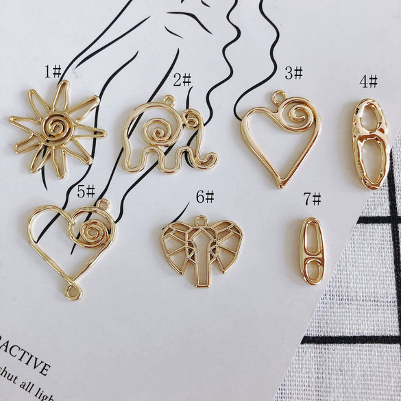 Wholesale Alloy Electroplated Jewelry Accessories Abstract Elephant Sunflower Heart Shaped Pendant Earrings
