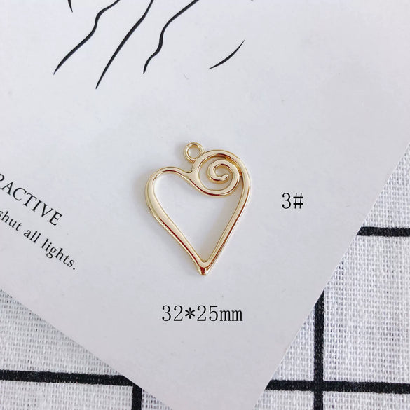 Wholesale Alloy Electroplated Jewelry Accessories Abstract Elephant Sunflower Heart Shaped Pendant Earrings