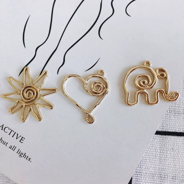 Wholesale Alloy Electroplated Jewelry Accessories Abstract Elephant Sunflower Heart Shaped Pendant Earrings