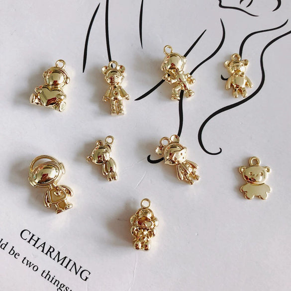 Wholesale Alloy Electroplated Jewelry Retro Literary Cut Out Bear Robot Pendant
