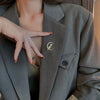 Wholesale Alloy Electroplated Minimalist Flower Shaped Women's Moon Kitten Brooch As Bag Accessory