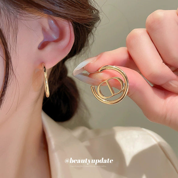 Wholesale Alloy Fashion Ol Letter Heart Earrings With Electroplating