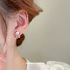 Wholesale Alloy Flower Patterned Diamond Treated Silver Needle Hollow Pearl Earrings For Women Simple Fresh Sweet And Personalized