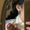 Wholesale Alloy Flower Shape Electroplated Silver Needle Flower Leaves Tassel Earrings For Women Fashion Retro High End