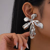 Wholesale Alloy Geometric And Flower Pattern Exaggerated Electroplated Women's Earrings
