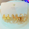 Wholesale Alloy Geometric Cshaped Electroplated Women's Earrings 3Piece Set