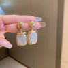 Wholesale Alloy Geometric Earrings With Diamond And Pearl Retro Light Luxury Electroplated For Women