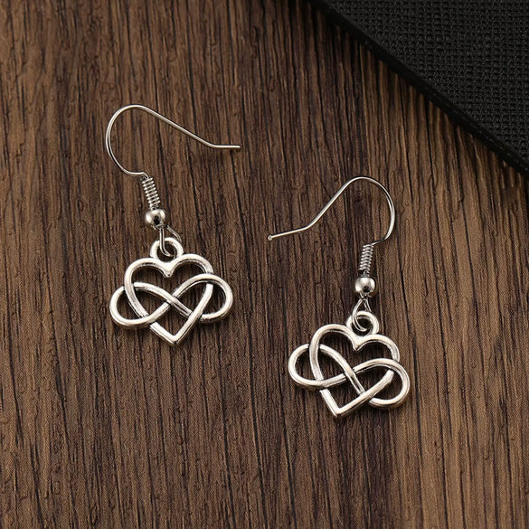 Wholesale Alloy Geometric Oval Spiral Hollow Pendant Earrings For Women Electroplated Retro Bohemian Style
