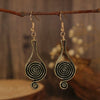 Wholesale Alloy Geometric Oval Spiral Hollow Pendant Earrings For Women Electroplated Retro Bohemian Style