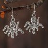 Wholesale Alloy Geometric Oval Spiral Hollow Pendant Earrings For Women Electroplated Retro Bohemian Style