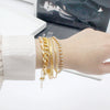 Wholesale Alloy Geometric Spiral Twist Metal Bracelet With Rhinestones And Electroplating For Women