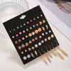 Wholesale Alloy Geometric Tassel Pearl Love Feather Earrings For Women With Electroplating
