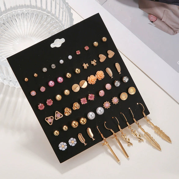 Wholesale Alloy Geometric Tassel Pearl Love Feather Earrings For Women With Electroplating