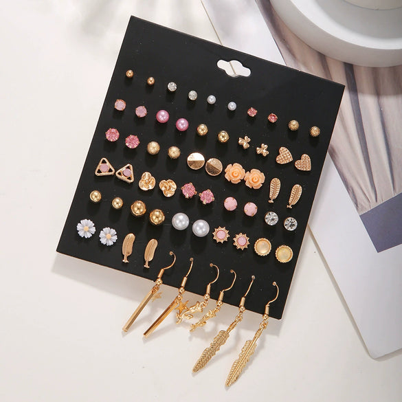 Wholesale Alloy Geometric Tassel Pearl Love Feather Earrings For Women With Electroplating