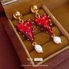 Wholesale Alloy High Sense Retro Geometric Electroplated Red Tassel Women's Earrings