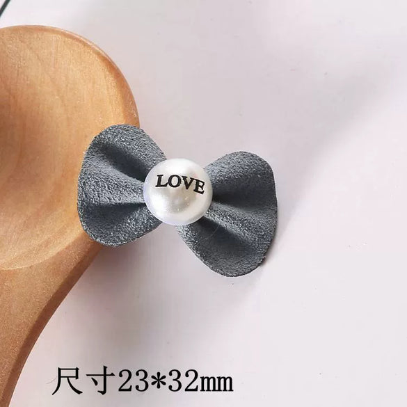 Wholesale Alloy Jewelry Accessories Fashion Bow Headwear And Cute Rabbit Phone Case Accessories With Electroplating