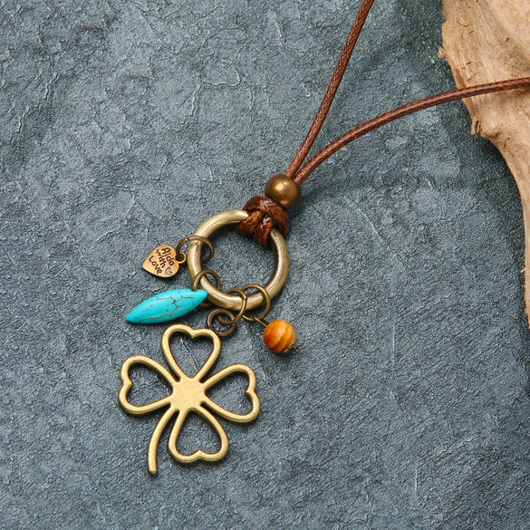 Wholesale Alloy Leaves Four Leaf Clover Pendant Necklace With Electroplating Vintage Fashion Style Unisex