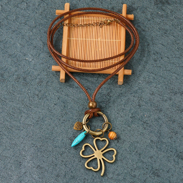 Wholesale Alloy Leaves Four Leaf Clover Pendant Necklace With Electroplating Vintage Fashion Style Unisex