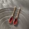 Wholesale Alloy Light Luxury Geometric Pomegranate Red Women's Earrings With Micropaved Zircon