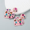 Wholesale Alloy Loveshaped Earrings With Inlaid Color Rhinestone And Diamond Design