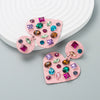 Wholesale Alloy Loveshaped Earrings With Inlaid Color Rhinestone And Diamond Design