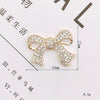 Wholesale Alloy Mobile Phone Shell Jewelry Accessories With Pearl Bow And Electroplating Treatment