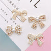 Wholesale Alloy Mobile Phone Shell Jewelry Accessories With Pearl Bow And Electroplating Treatment
