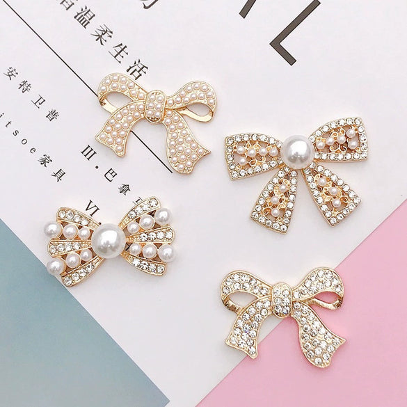 Wholesale Alloy Mobile Phone Shell Jewelry Accessories With Pearl Bow And Electroplating Treatment