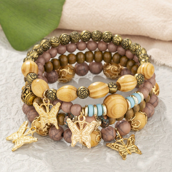 Wholesale Alloy Multilayer Wooden Beaded Bohemian Style Bracelet With Butterfly Pendant And Electroplating Treatment