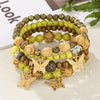 Wholesale Alloy Multilayer Wooden Beaded Bohemian Style Bracelet With Butterfly Pendant And Electroplating Treatment