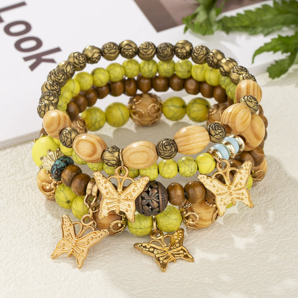 Wholesale Alloy Multilayer Wooden Beaded Bohemian Style Bracelet With Butterfly Pendant And Electroplating Treatment