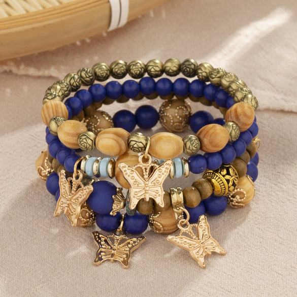 Wholesale Alloy Multilayer Wooden Beaded Bohemian Style Bracelet With Butterfly Pendant And Electroplating Treatment