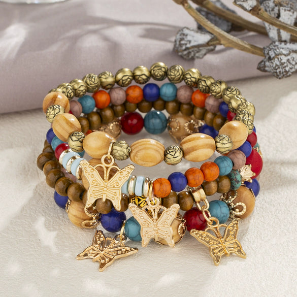 Wholesale Alloy Multilayer Wooden Beaded Bohemian Style Bracelet With Butterfly Pendant And Electroplating Treatment