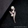 Wholesale Alloy Natural Style Leaf Feather Rhinestone And Pearl Brooch With Flower Pattern And Electroplating Treatment For Ladies