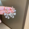 Wholesale Alloy Pearl Inlaid Bow Earrings For Women Silver Needle Light Luxury Personality Style