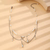Wholesale Alloy Pearl Tassel Cross Geometric Clavicle Chain Necklace For Women With Electroplating