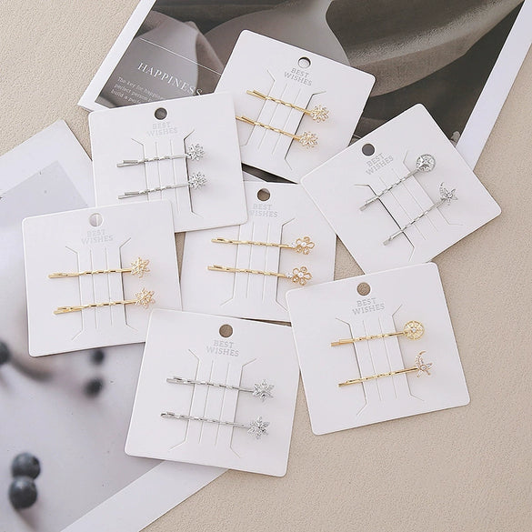 Wholesale Alloy Princess Style Planet Pearl Moon Snowflake Flower One Word Clip Hairpin With Electroplating