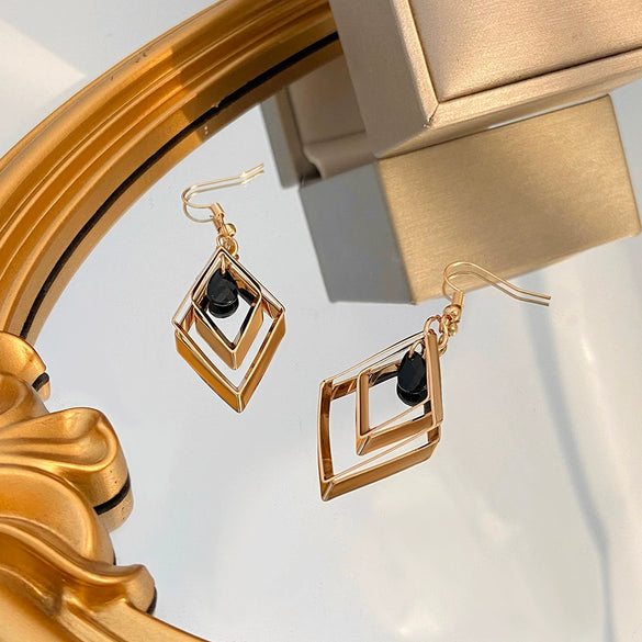 Wholesale Alloy Retro Diamond Geometric Black Water Drop Hollow Rhinestone Women's Earrings With Electroplating