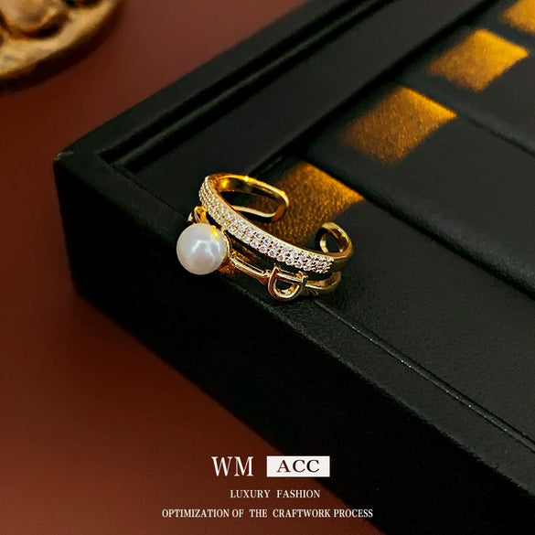 Wholesale Alloy Retro Geometric Asymmetrical Ushaped Pearl Ring For Women With Electroplating Treatment