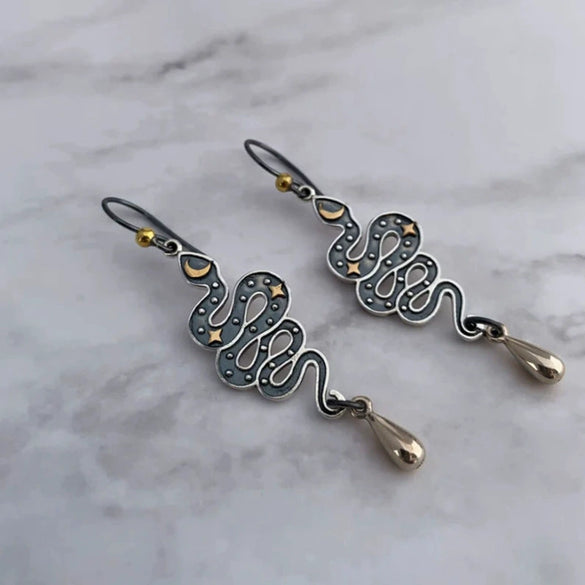 Wholesale Alloy Retro Gothic Snakeshaped Earrings With Star And Moon Elements And Electroplating Treatment For Women
