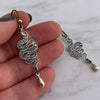 Wholesale Alloy Retro Gothic Snakeshaped Earrings With Star And Moon Elements And Electroplating Treatment For Women