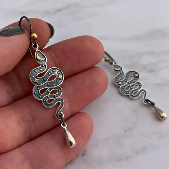 Wholesale Alloy Retro Gothic Snakeshaped Earrings With Star And Moon Elements And Electroplating Treatment For Women