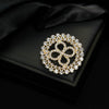 Wholesale Alloy Rhinestone Bow Brooch With Fixed Antiwalking Pin And Electroplating Design