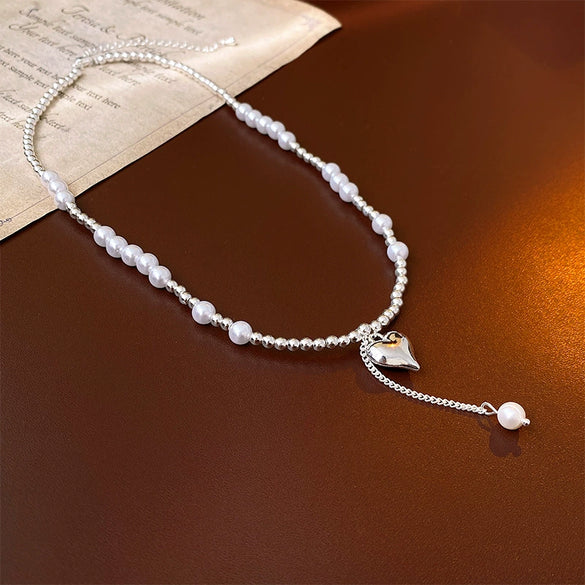Wholesale Alloy Silver Heart Pearl Clavicle Chain Necklace For Women With Electroplating