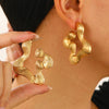 Wholesale Alloy Women's Asymmetric Heartshaped Liquid Lava Earrings With Geometric Pattern And Electroplating