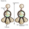 Wholesale Alloy Women's Retro Bohemian Style Flower Patterned Turquoise Earrings With Diamond Treatment