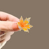 Wholesale Alloy Women's Vintage Natural Style Flower Pattern Electroplated Maple Leaf Antiexposure Brooch Clothes Pin Accessories