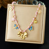 Wholesale Ancient Style Insect Bow Tie Stainless Steel Gold Electroplated Pendant Necklace For Women